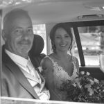 Bride and Father of the Bride in wedding car